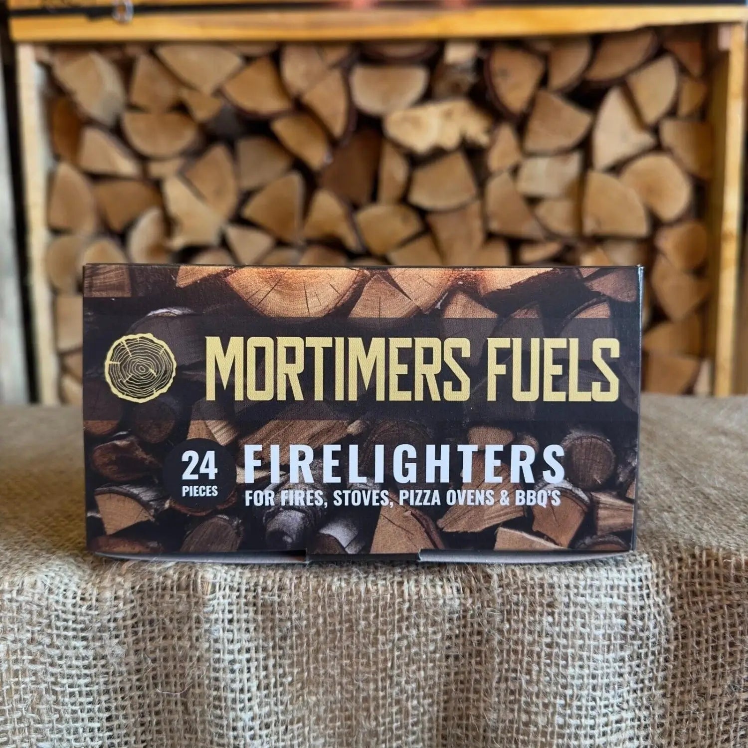 Box of Mortimer's Fuels firelighters with a wooden background