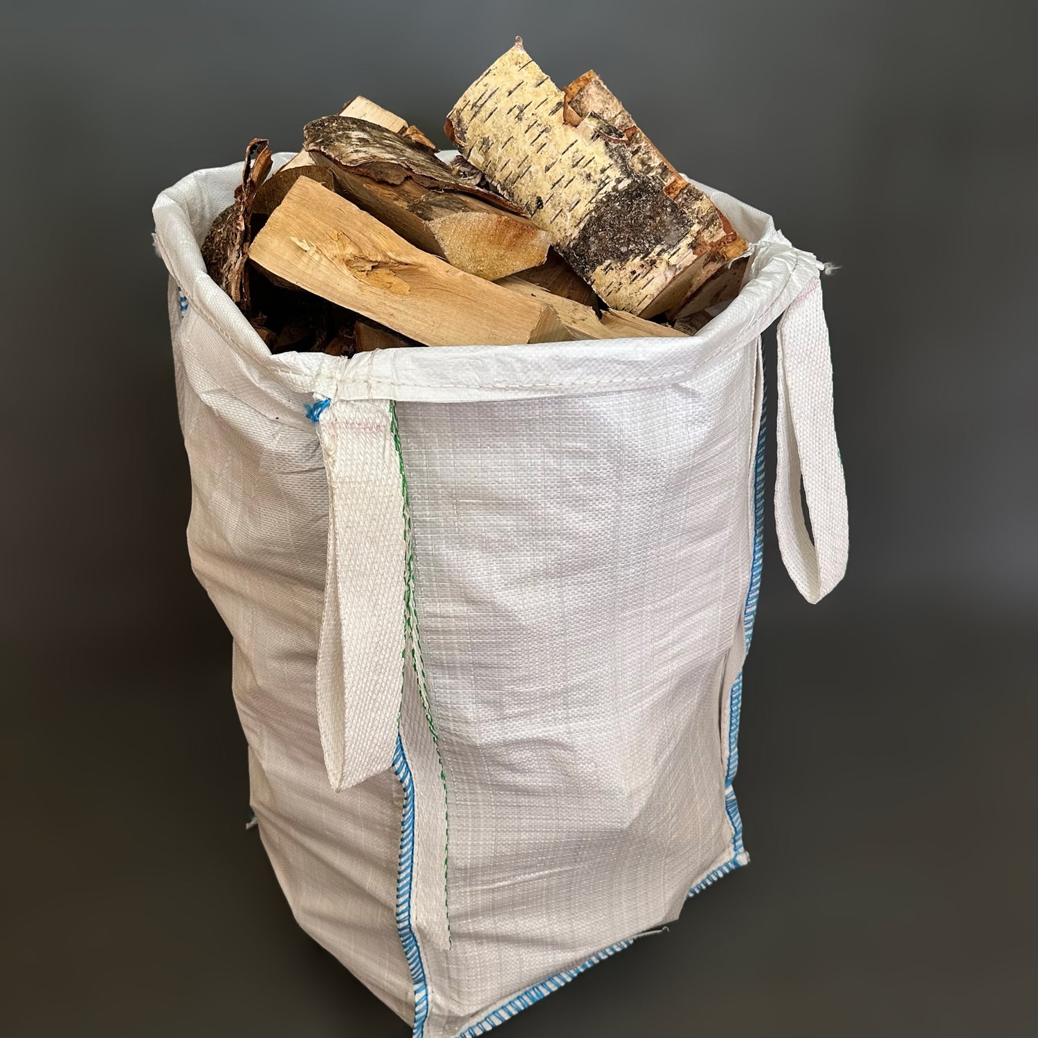 Birch Barrow Bag of kiln-dried firewood from Mortimers Fuels, perfect for fireplaces and stoves.